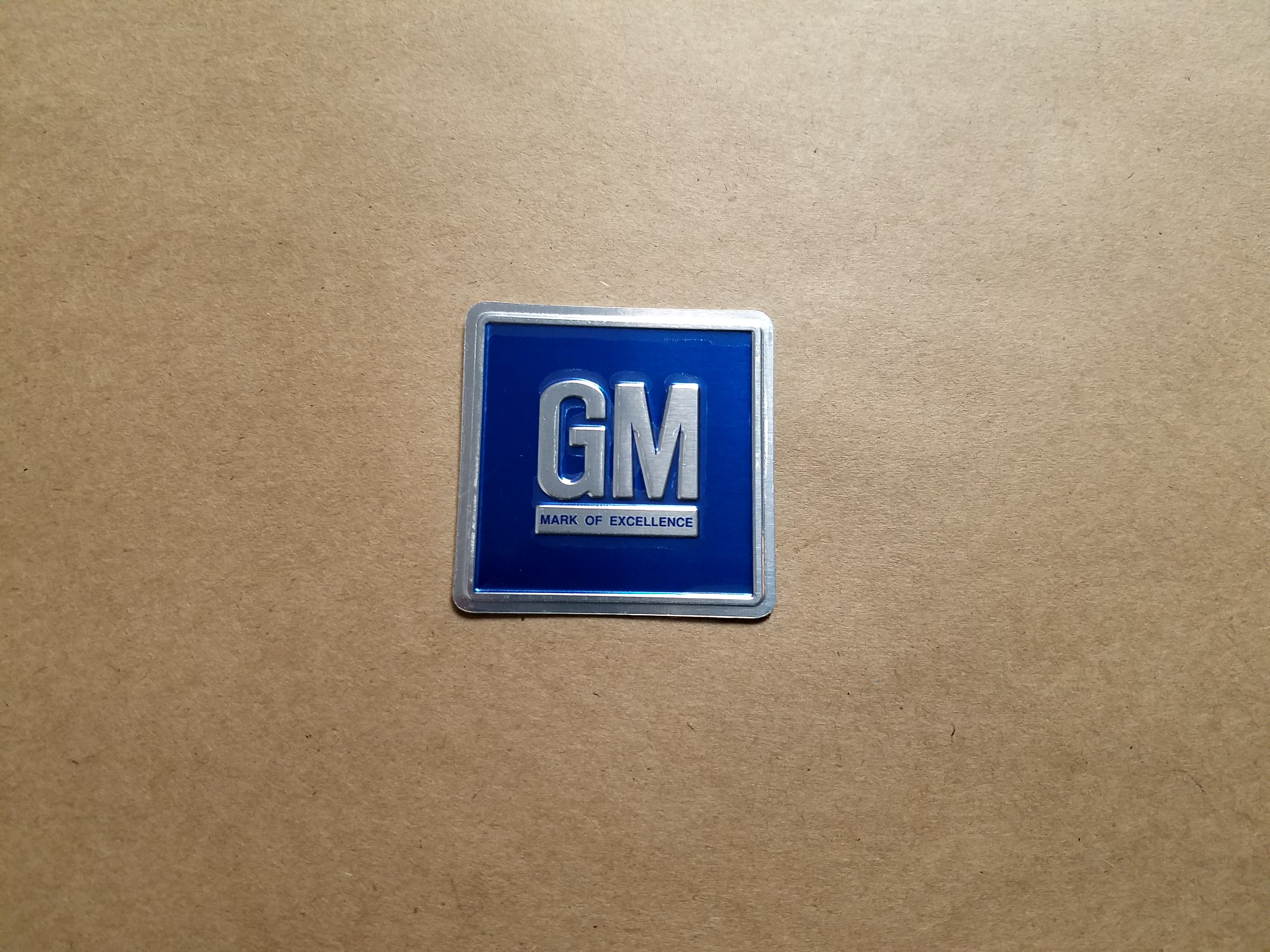 GM Mark of Excellence Metal Plate