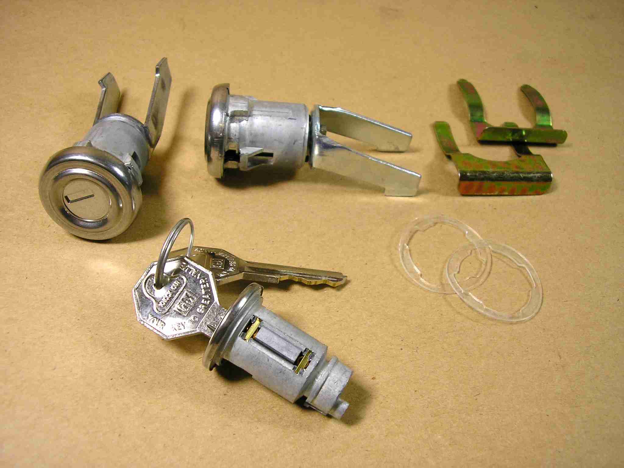 1955-57 Ignition & U-Pawl Door Safety Lock Assemblies, set w/ original octagon keys, gaskets & u-clips, 1955-57 All exc 2dr Hardtop & Convertible